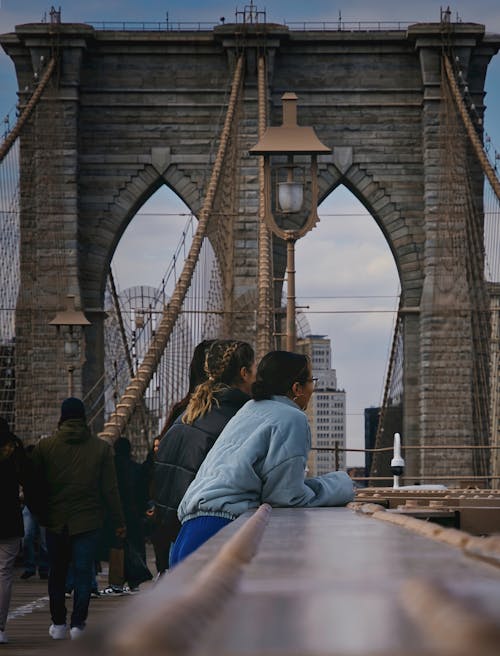 Free People at the Brooklyn Bridge  Stock Photo