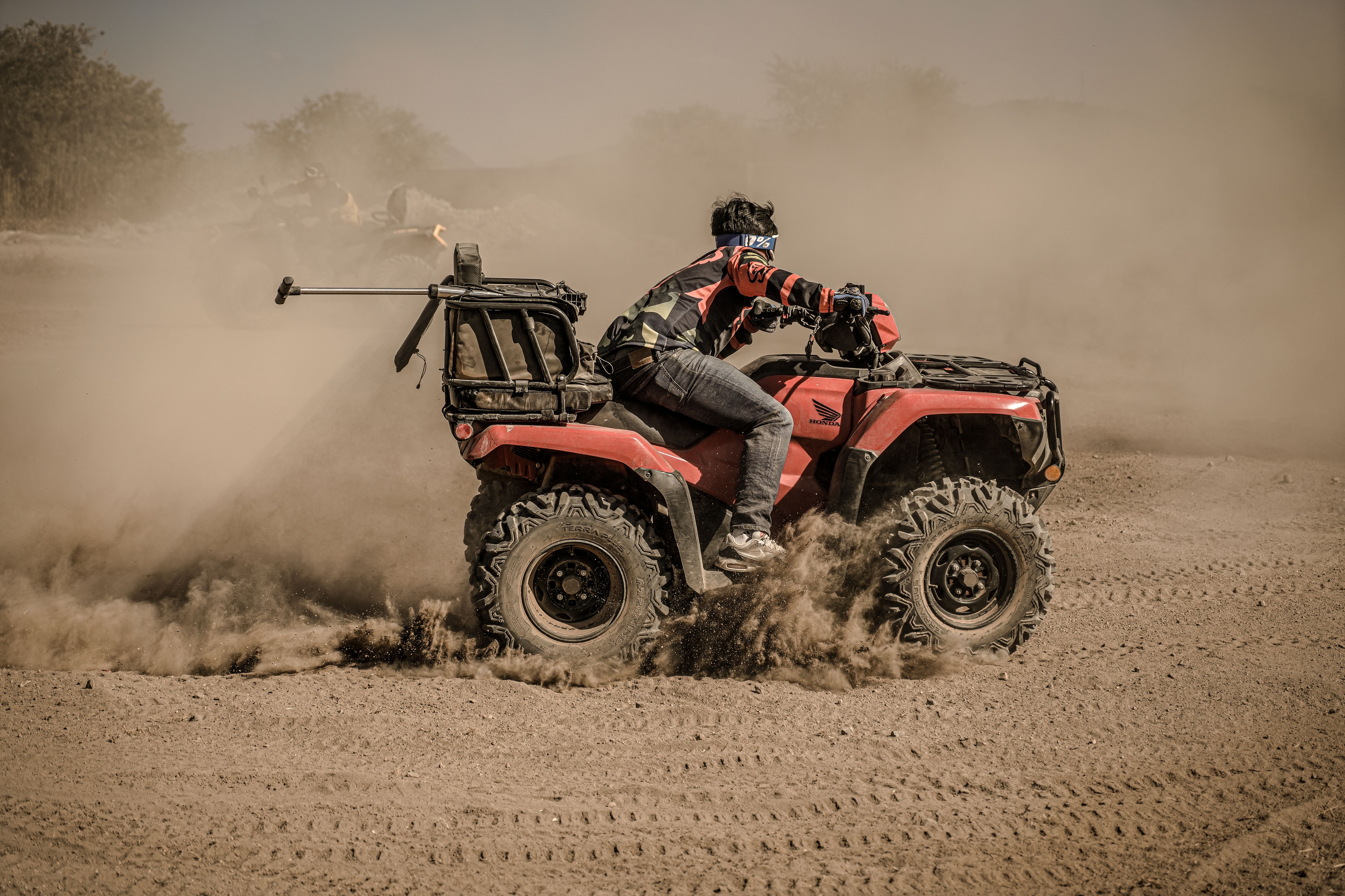 Man Riding on 4x4 Quad Bike · Free Stock Photo