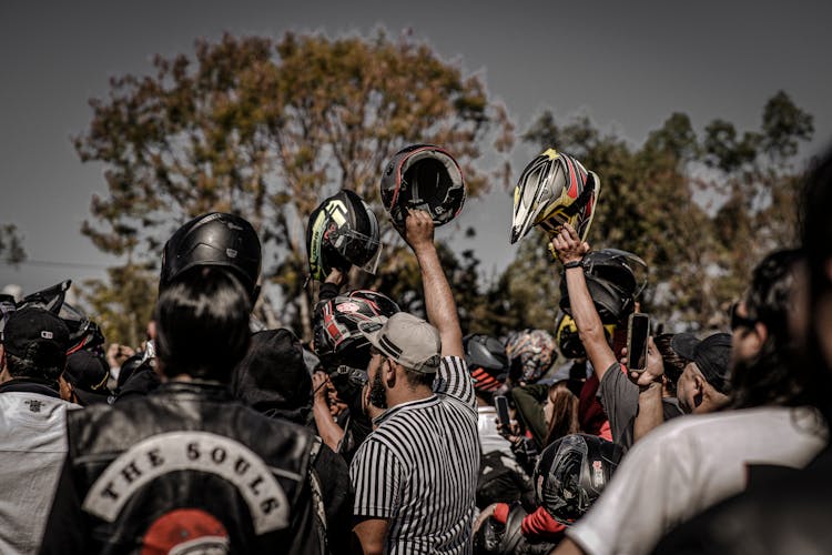 Men Rising Up Helmets