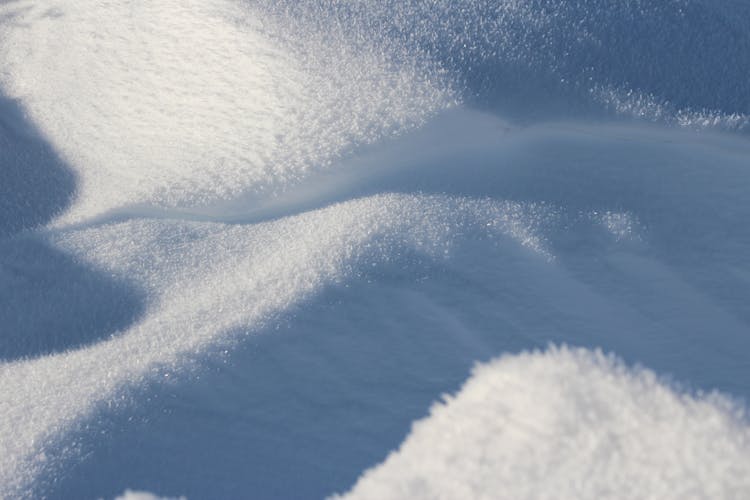 White Snow On Blue Textile