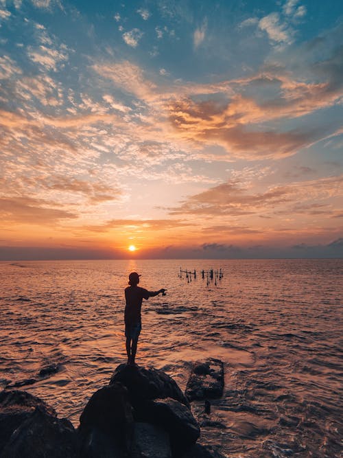 Ilmainen kuvapankkikuva tunnisteilla auringonlasku, kalastaja, kalastus