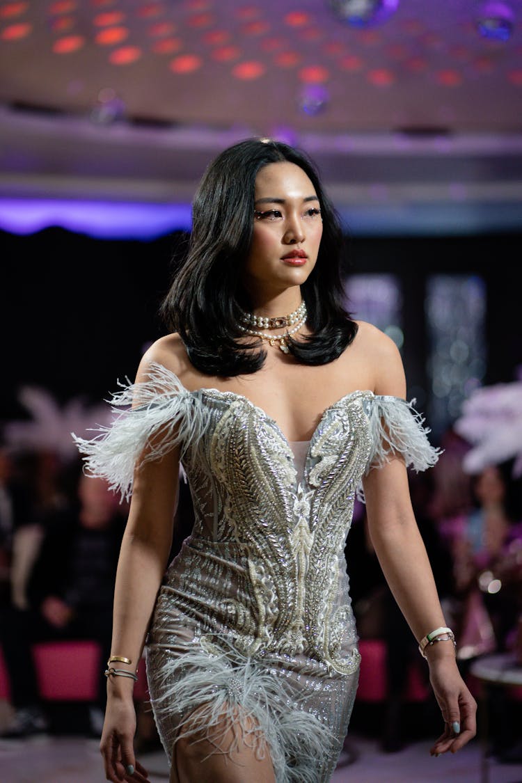 Woman Wearing Silver Dress Walking 