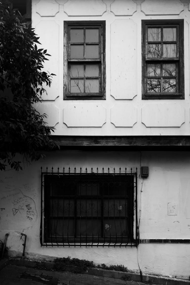 Grayscale Photo Of A House Exterior