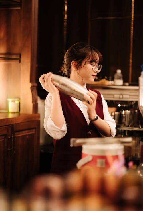 A Bartender Preparing a Cocktail 