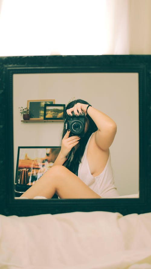 Woman Taking a Mirror Selfie