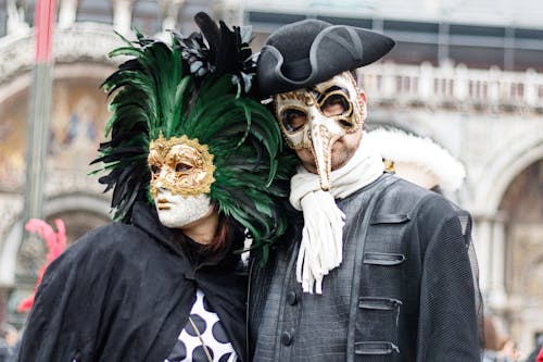 Woman and Man Posing in Medieval Costumes