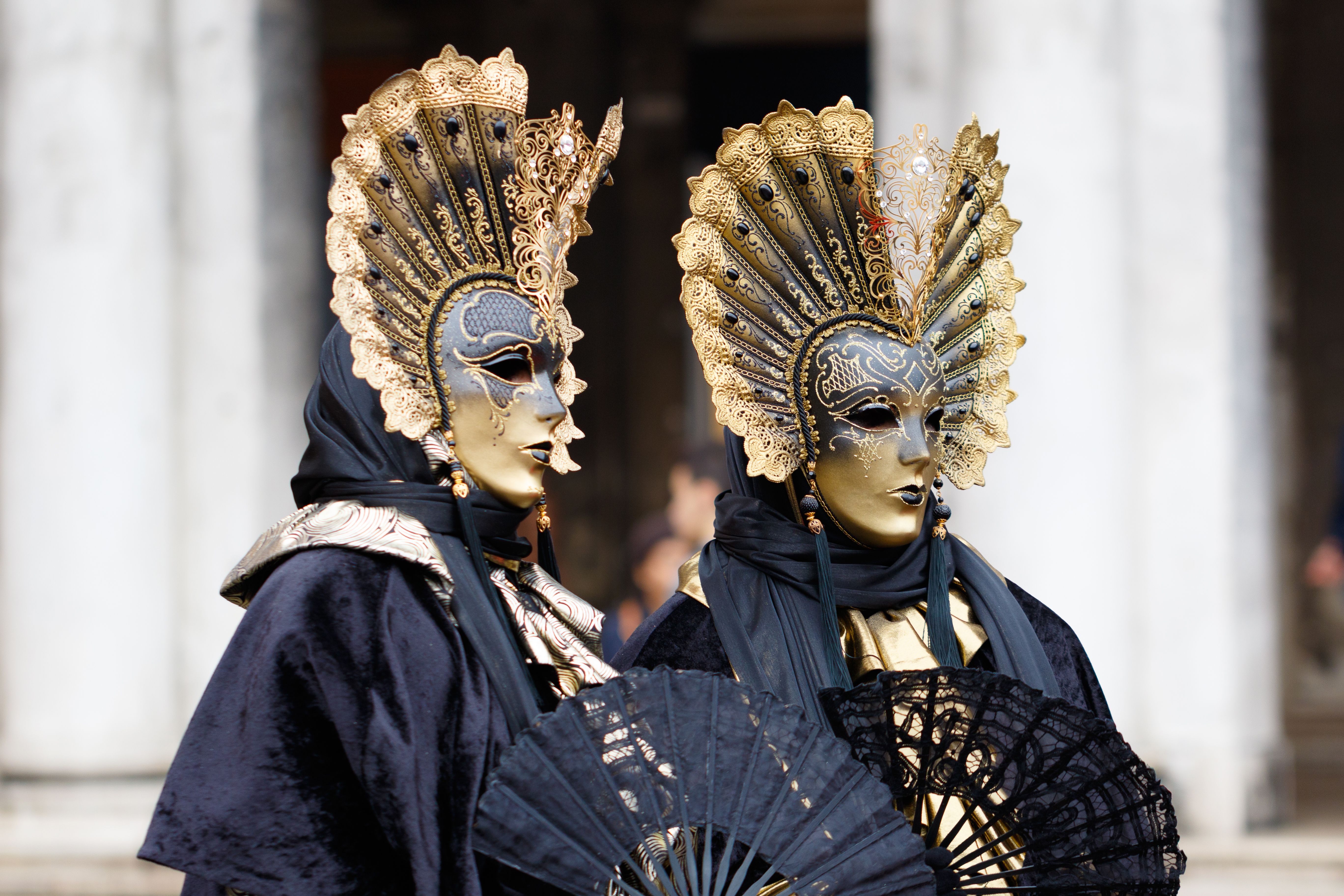 People Posing in Costumes with Golden Masks · Free Stock Photo