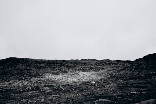 Foto profissional grátis de colina, construção, estéril