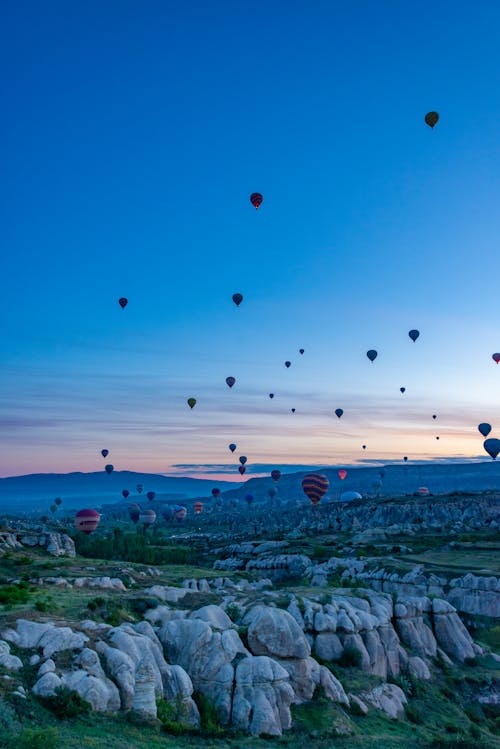 Balloons over Cappadocia Rock Formations