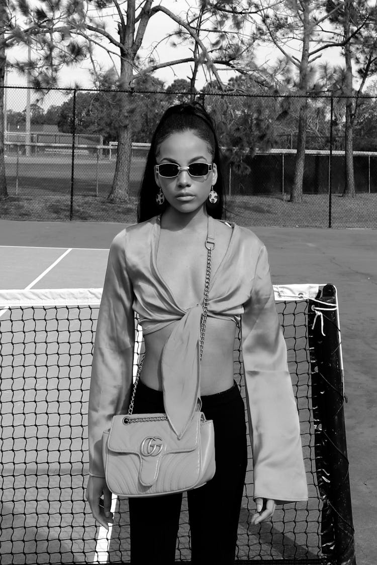 Woman Portrait On Tennis Court