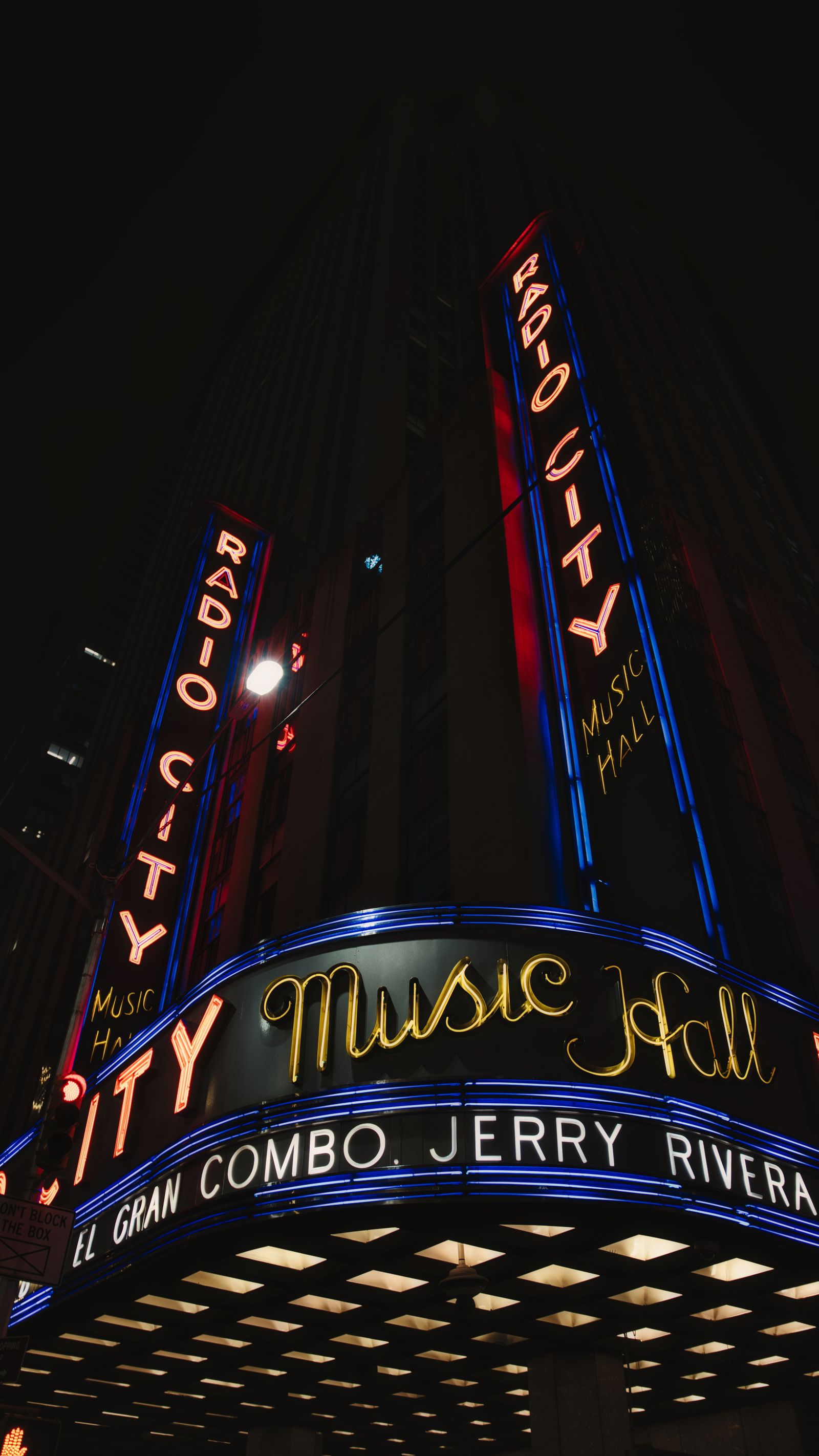 Radio City Music Hall's illuminated facade at night