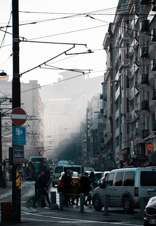 A Busy City Street in Fog 