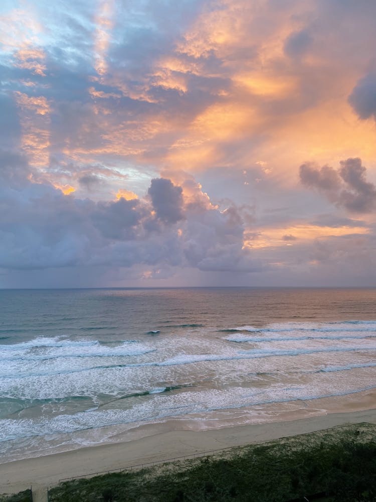 Seascape With Waves And Clouds In Sky