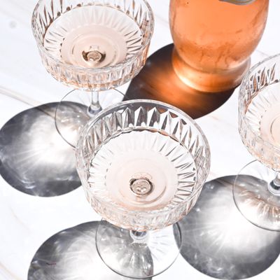 Three coupe glasses of sparkling rosé — photo by Studio Naae on Pexels