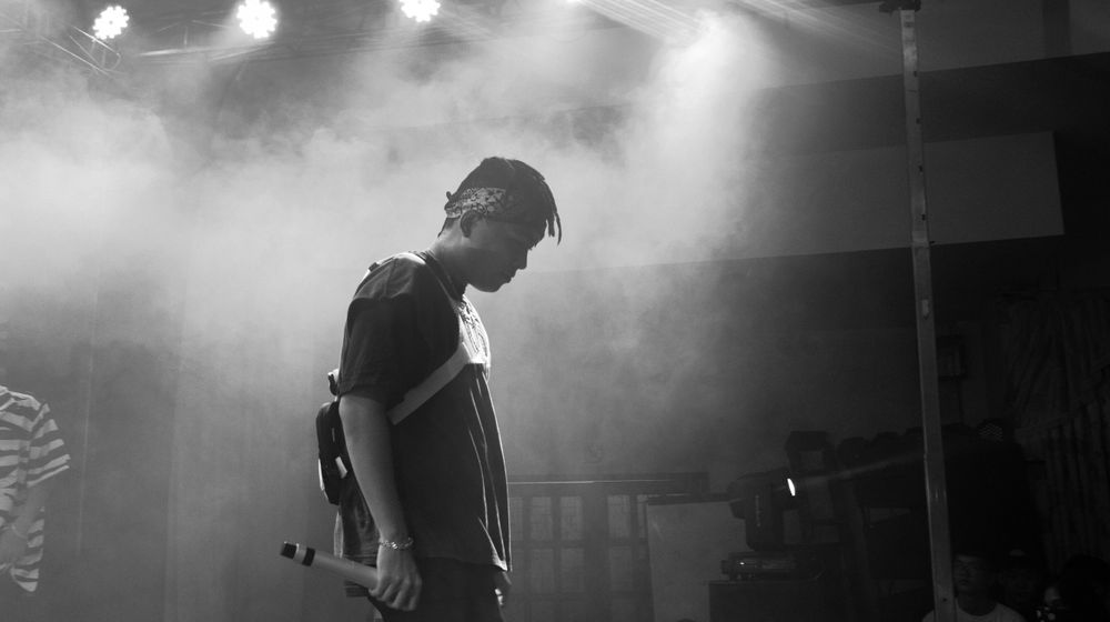 Musician performing live on stage