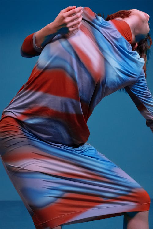 Model Posing in Colorful Dress
