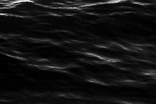 Free Dark Waves Rippling Water Surface Stock Photo