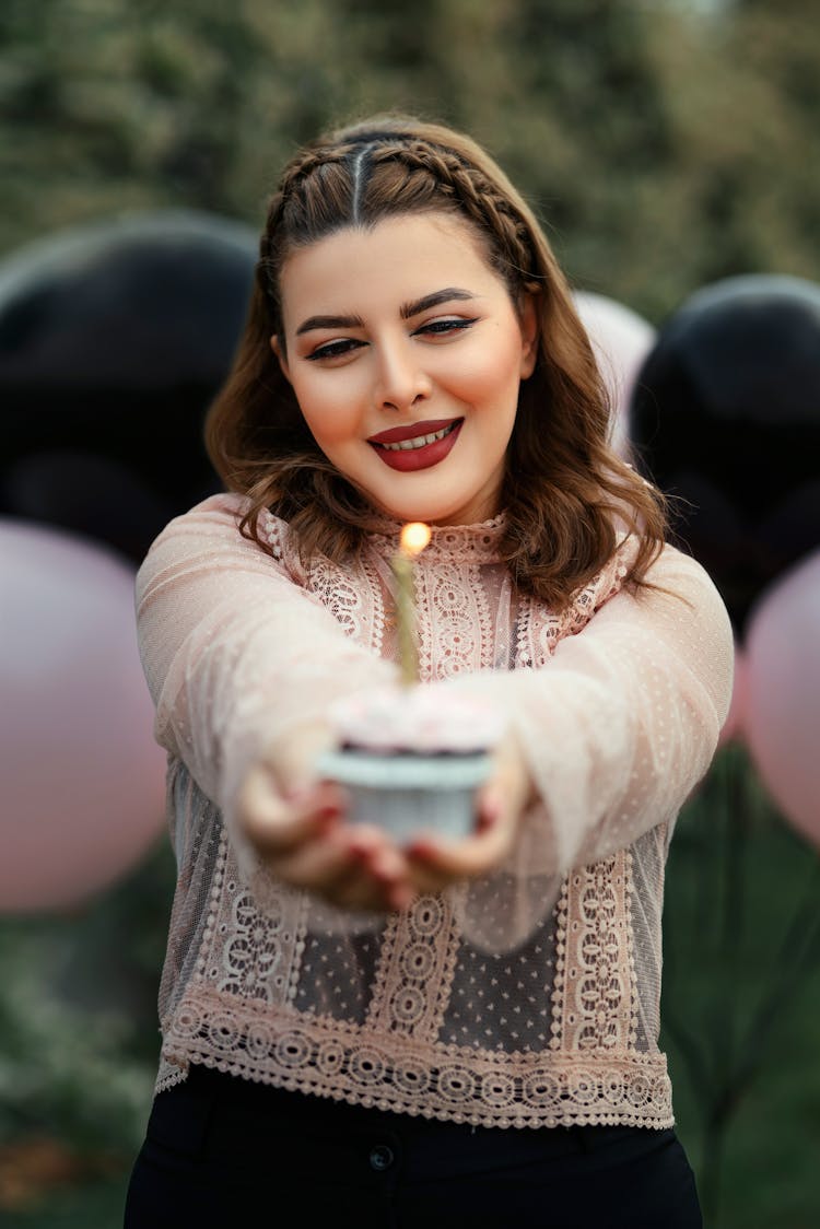 Smiling Girl Celebrating Birthday Outdoors