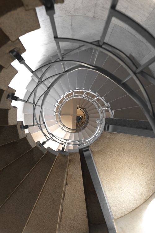 Free Vertigo-inducing architectural spiral staircase captured in Berlin. Stock Photo