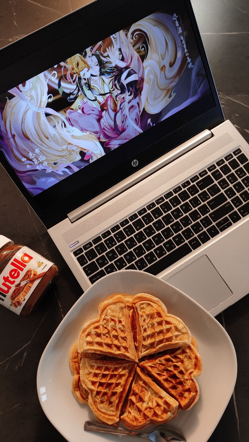 Waffle On Computer Laptop and Waffles on a Plate · Free Stock Photo