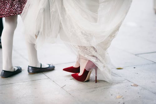 A Woman Wearing Red High Heels 
