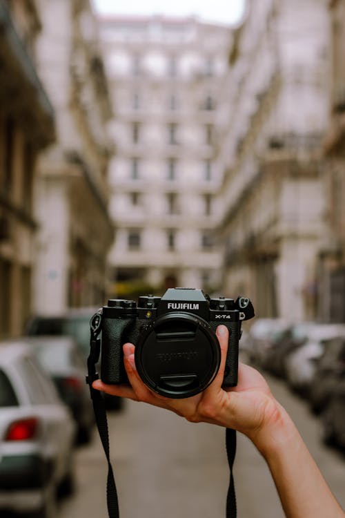 Hand Holding Fujifilm Camera