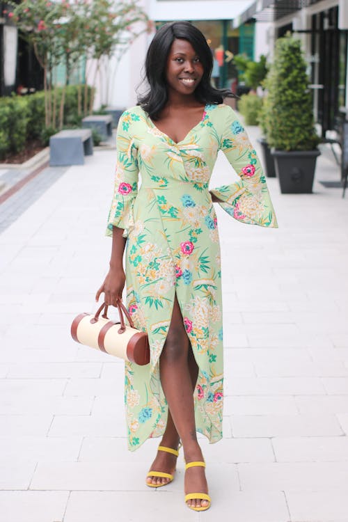 Woman Holding Tubular Bag