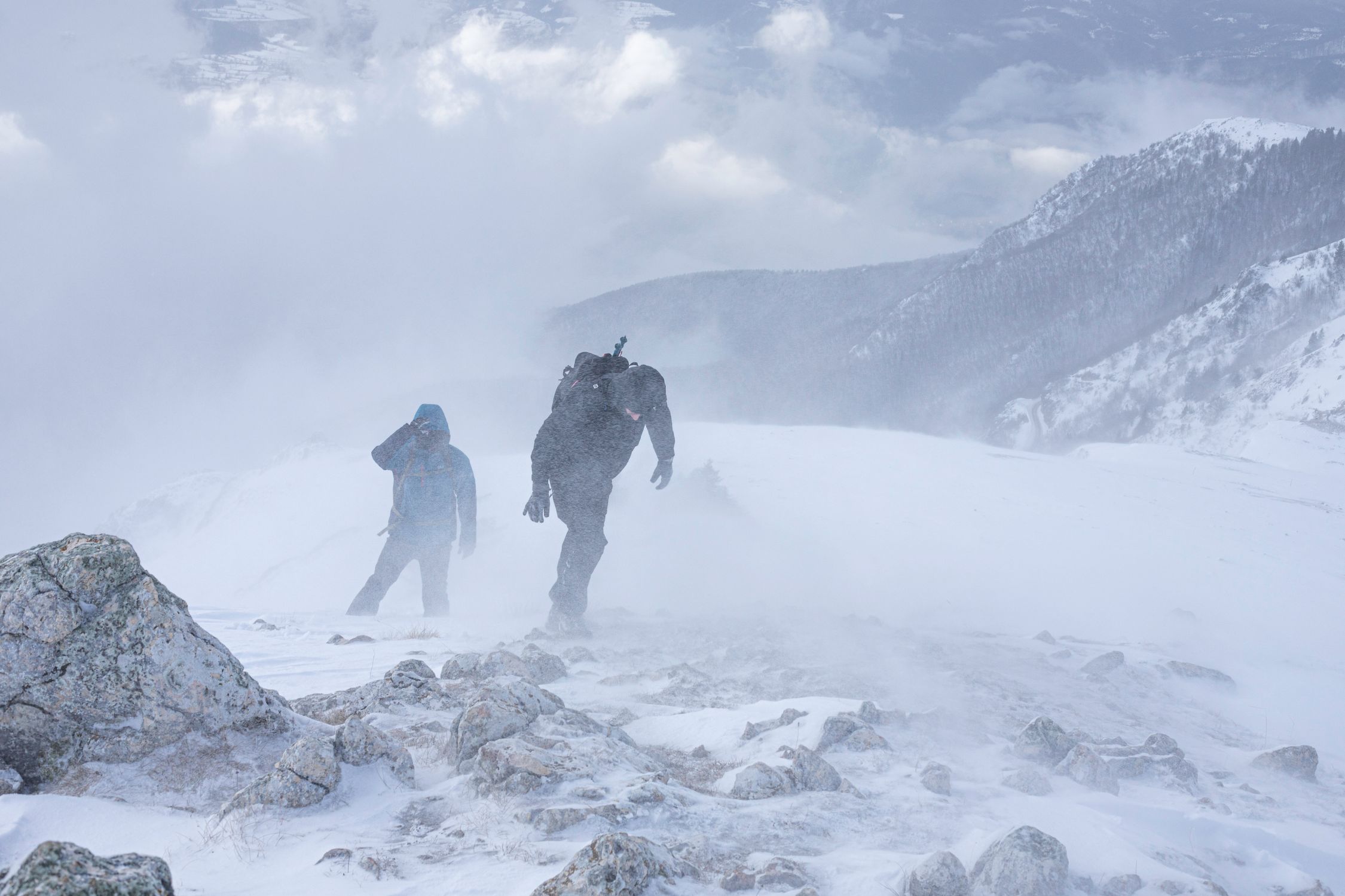 People Climbing Mountain in Snow · Free Stock Photo