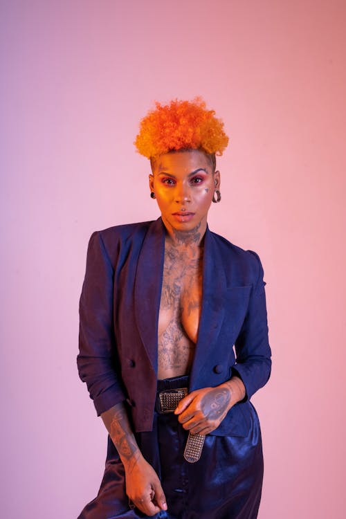Blonde Woman with Tattoos in Suit Jacket