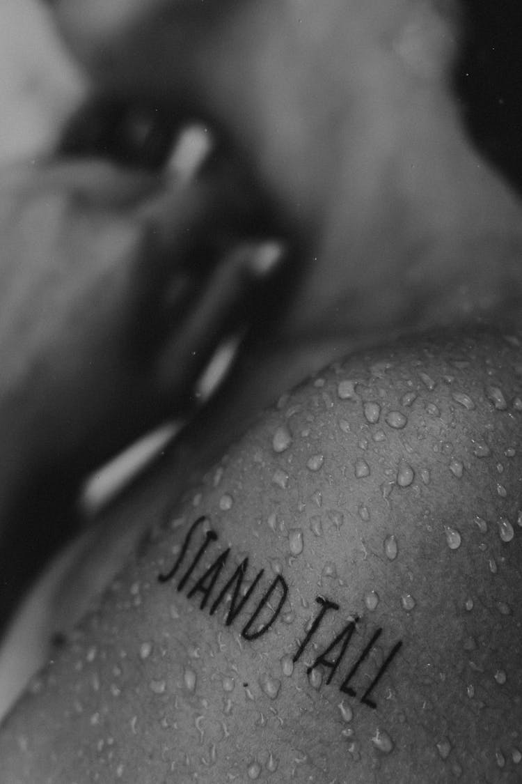 Close-up Of A Tattoo On Wet Skin 