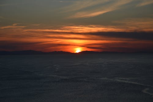 Безкоштовне стокове фото на тему «гори, горизонт, Захід сонця»