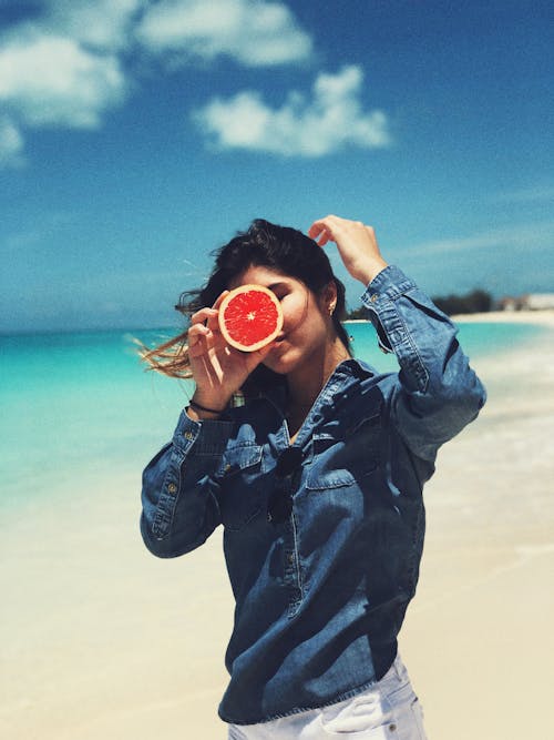 Free Woman Holding Grapefruit Stock Photo