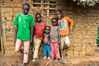 Five children stand together in a rural village in Mintom, Cameroon.