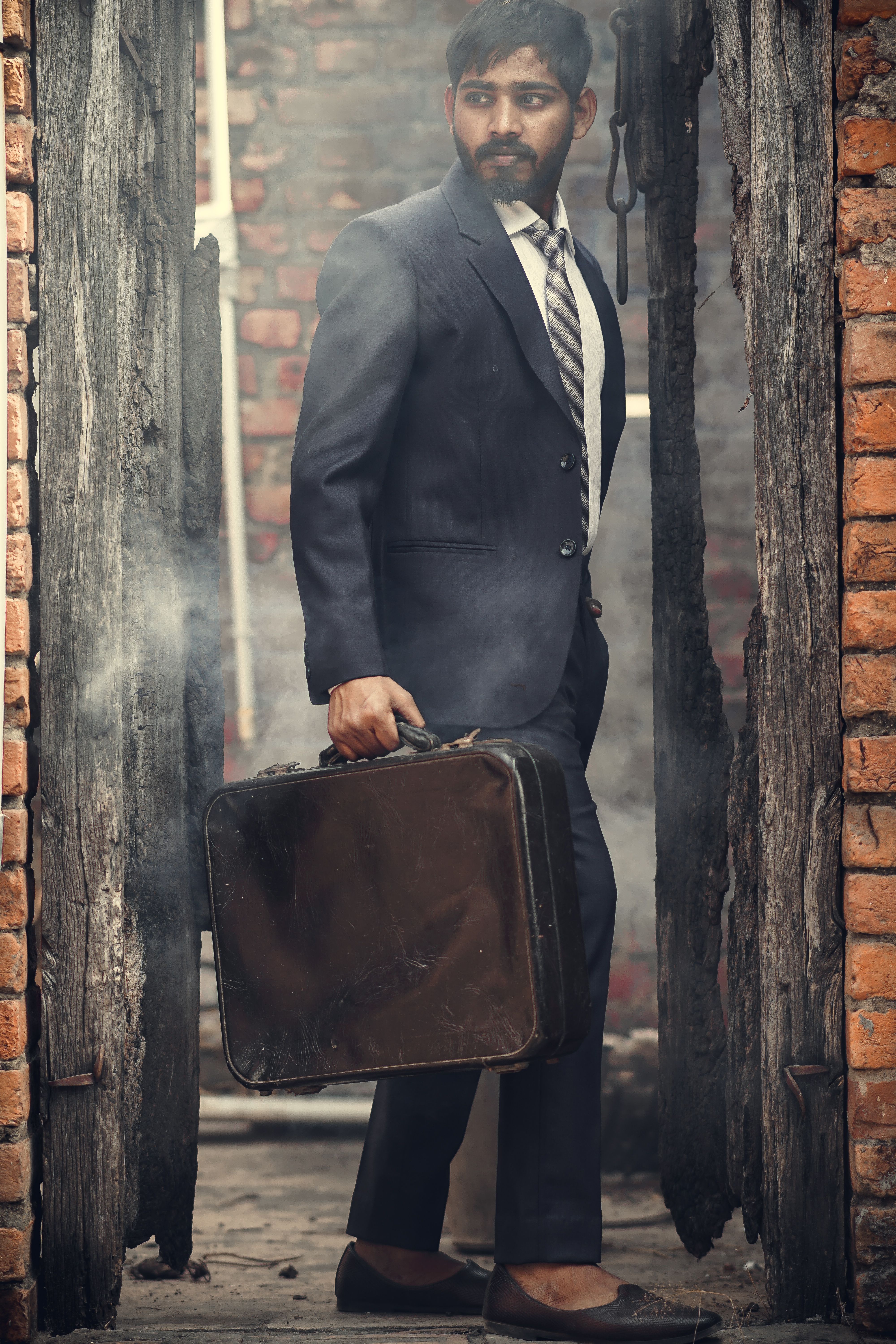 Man in Suit with Suitcase · Free Stock Photo