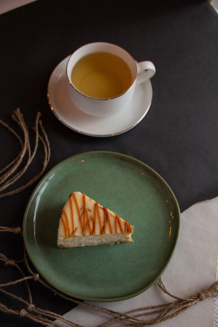 Cup Of Tea And Cake On Plate