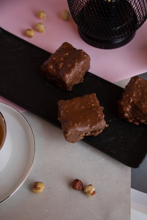 Chocolate Bars and Peanuts on Table