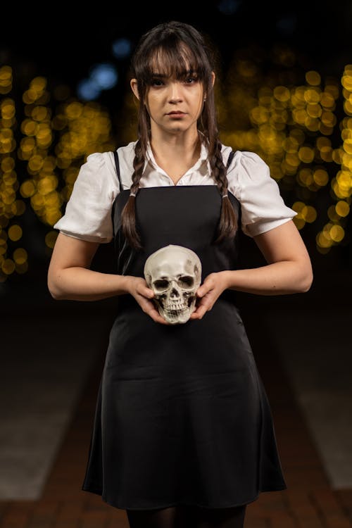 Woman with Skull Celebrating Day of the Dead