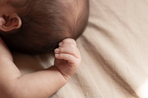 Close up of Baby Hand and Head