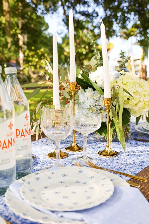 Elegant Serving Dishes on Table in Yard