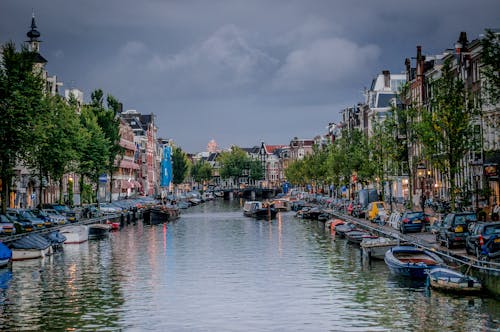 Dark Sky over the Canal in Amsterdam, the Netherlands 