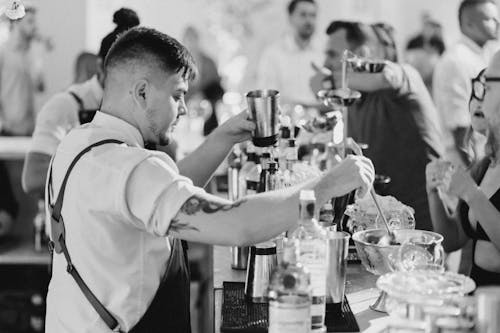 A Bartender Making a Cocktail 