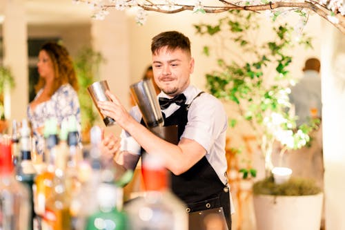 A Bartender Making a Cocktail 