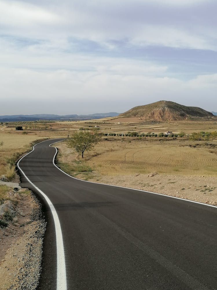 Asphalt Road Through Desert