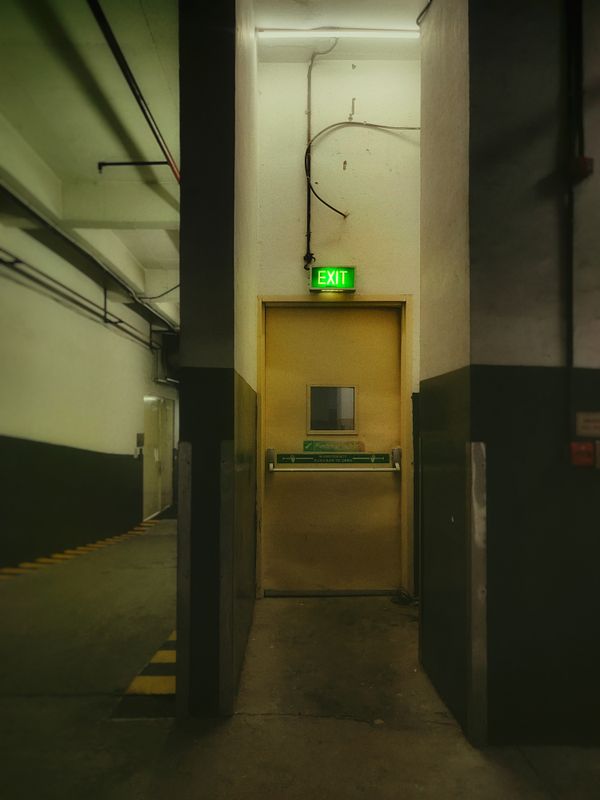 Emergency Exit in an Industrial Building · Free Stock Photo
