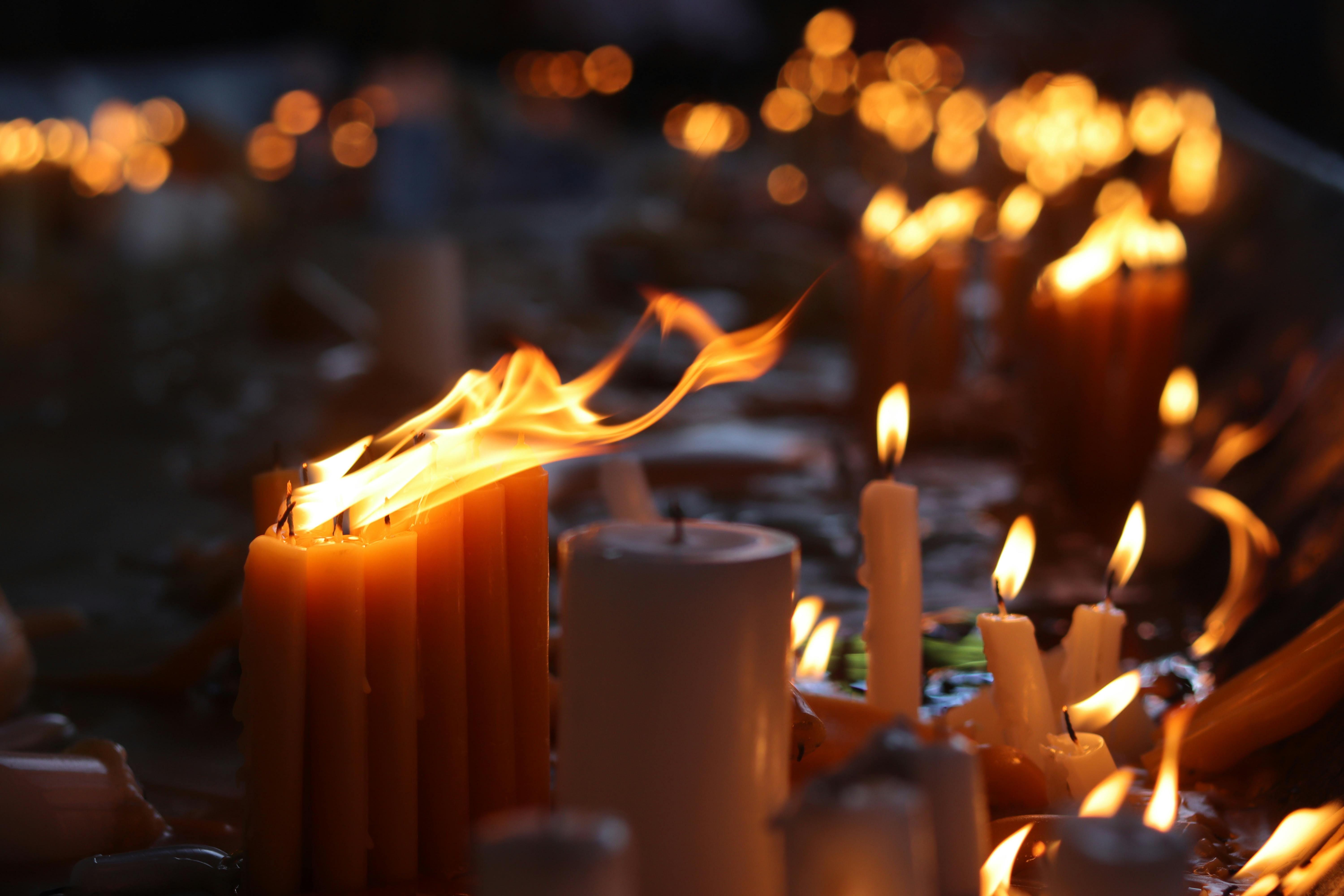 Burning Yellow Candles · Free Stock Photo