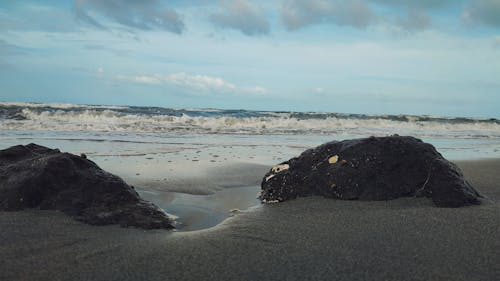 Foto d'estoc gratuïta de platja, roques, sorra