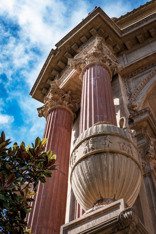 Stone Old Building with Columns against Blue Sky