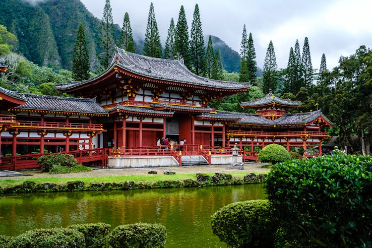 Byodo In Temple Among Lush Foliage