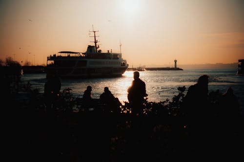 Бесплатное стоковое фото с закат, корабль, море