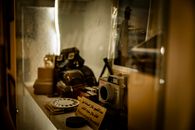 A nostalgic display of vintage cameras in a Kuwait City museum exhibit.